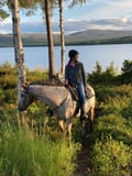 Small group horseback riding in village Pyhäjärvi