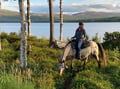 Small group horseback riding in village Pyhäjärvi