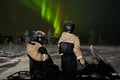 Arctic Aurora Chase by Snowmobile