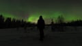 AURORAS WITH SNOWMOBILE