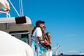 Travelers watching whales from a boat in Reykjavík Iceland