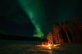 Northern Lights Hunting in Lappish old cottage