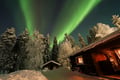 Northern Lights Hunting in Lappish old cottage