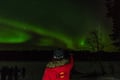 Northern Lights Hunting in Lappish old cottage