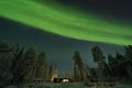 Northern Lights Hunting in Lappish old cottage