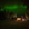 Northern Lights Hunting in Lappish old cottage