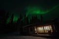 Northern Lights Hunting in Lappish old cottage