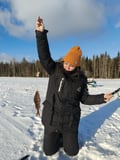 ICE FISHING EXPERIENCE ON A FROZEN LAKE