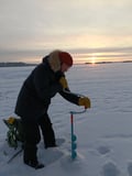 ICE FISHING EXPERIENCE ON A FROZEN LAKE