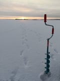ICE FISHING EXPERIENCE ON A FROZEN LAKE