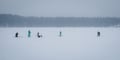 Ice fishing at the frozen lake