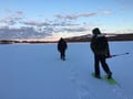 Ice fishing at the frozen lake