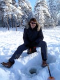 Ice fishing at the frozen lake