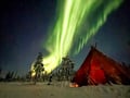 Arctic Night Family Snowmobile Safari with Campfire, Levi