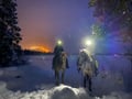 A small group horseback riding tour in the snow