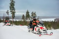 4 h electric snowmobile safari in Rovaniemi