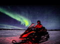 Arctic Night Family Snowmobile Safari with Campfire, Levi