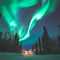 Searching for Northern Lights by Snowmobile