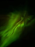 Searching for Northern Lights by Snowmobile