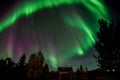 Searching for Northern Lights by Snowmobile
