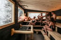 a people enjoying soft steam in a sauna