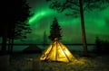 Northern lights picnic by the lake, Rovaniemi, Lapland, Finland