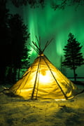 Northern lights picnic by the lake, Rovaniemi, Lapland, Finland