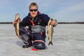 Ice Fishing On The Frozen Lake