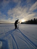 Ice Fishing Experience by the lake, Rovaniemi, Lapland, Finland