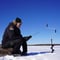Ice Fishing Experience by the lake, Rovaniemi, Lapland, Finland