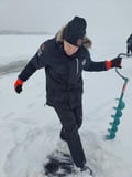 Ice Fishing Experience by the lake, Rovaniemi, Lapland, Finland