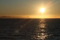 Sunset over the ocean viewed from a whale watching boat near Reykjavík