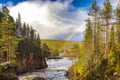 Rainbow over the river in Lapland