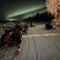 Chasing the Northern Lights by snowmobile
