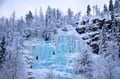 Majestic frozen waterfalls in Korouoma Canyon