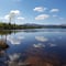 Arctic summer SUP boarding on a lake and river