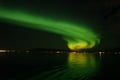Travelers enjoying a Northern Lights boat tour near Reykjavík