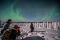 Northern Lights hunting photography tour in Levi