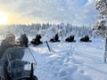 A SNOWMOBILE SAFARI 2,5h, in snowy forest, Levi