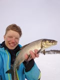 Ice fishing trip at Lake Inari