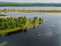 Canoe Down the River Trip in Lapland