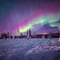 Night Snowshoeing Adventure under the Northern Lights