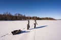 Ice fishing on a frozen lake