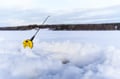 Ice fishing on a frozen lake