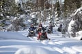 Snowmobile adventure in the middle of Arctic wilderness