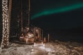 Dinner in a Glass Igloo Under Northern Lights