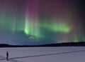 Watching northern lights at a lake